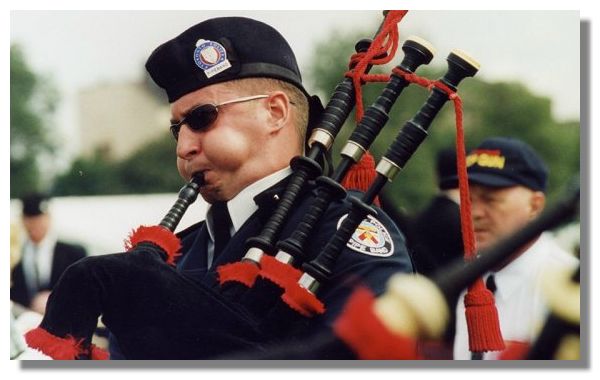 Piper, Toronto Police Pipe Band at the World Pipe Band Championships, Glasgow Green