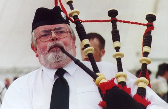 Piper at the World Pipe Band Championships, Glasgow Green.